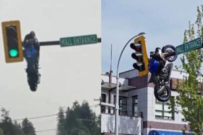 Kanada'da ilginç kaza: Motosiklet trafik ışığında asılı kaldı